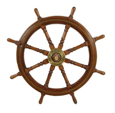 A teak and brass mounted ship s wheel with eight