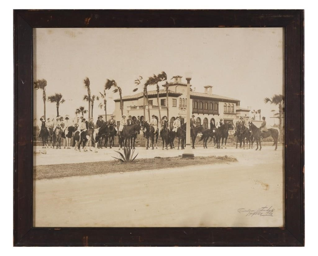 Antique photographic print of men women and children on horseback