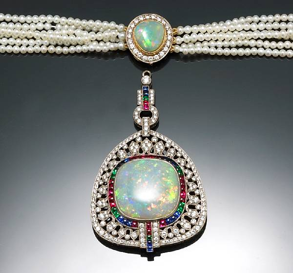 An opal cultured pearl synthetic gemstone and diamond pendant necklace