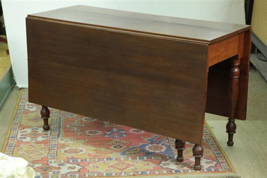 DROP LEAF TABLE Walnut with large rectangular leaves and turned
