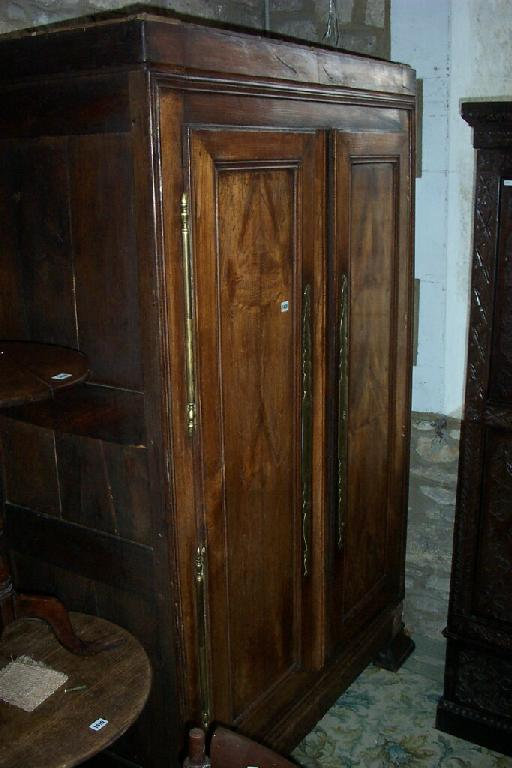 An 18th century French provisional chestnut armoire enclosed by two