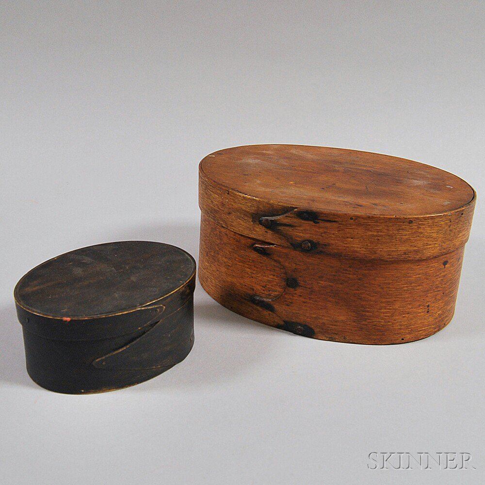 Two Oval Covered Boxes America 19th century a small black