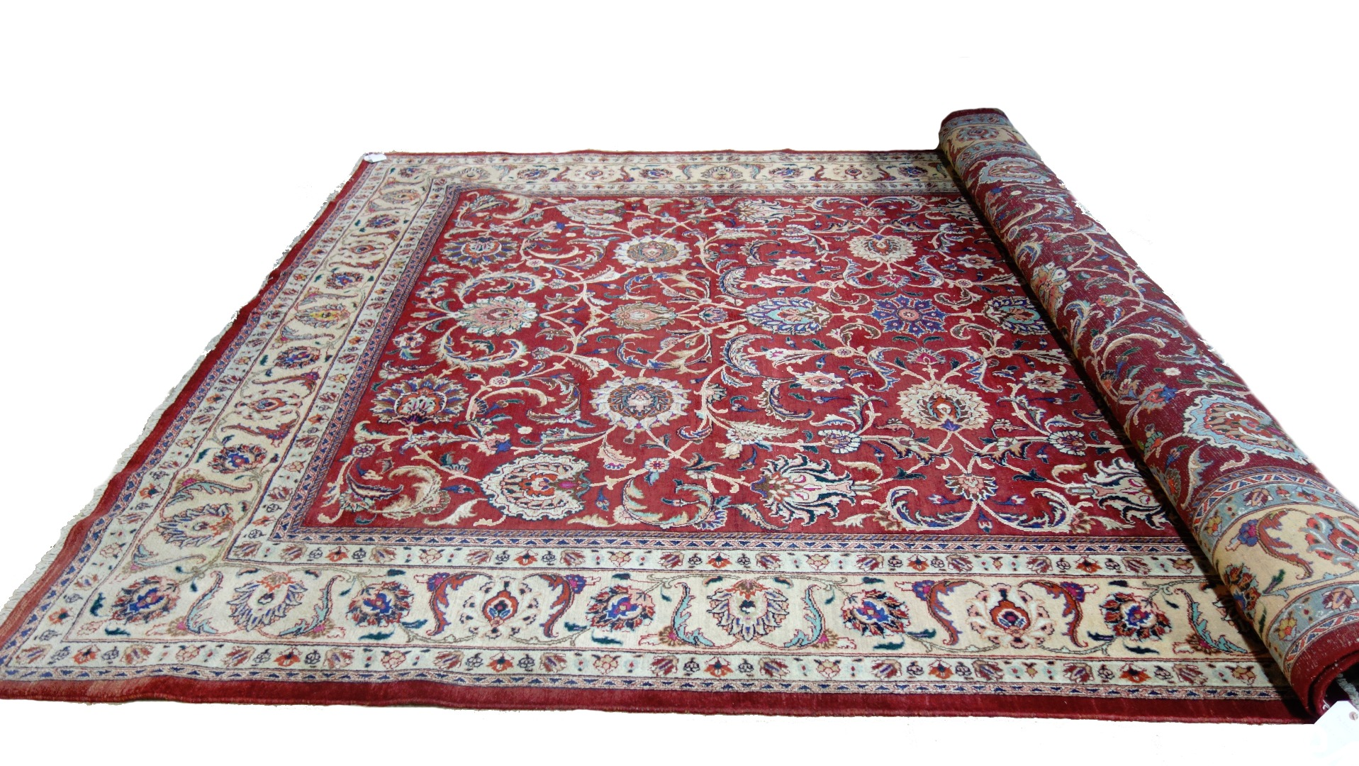 A Mashed carpet Persian the dark madder field with an