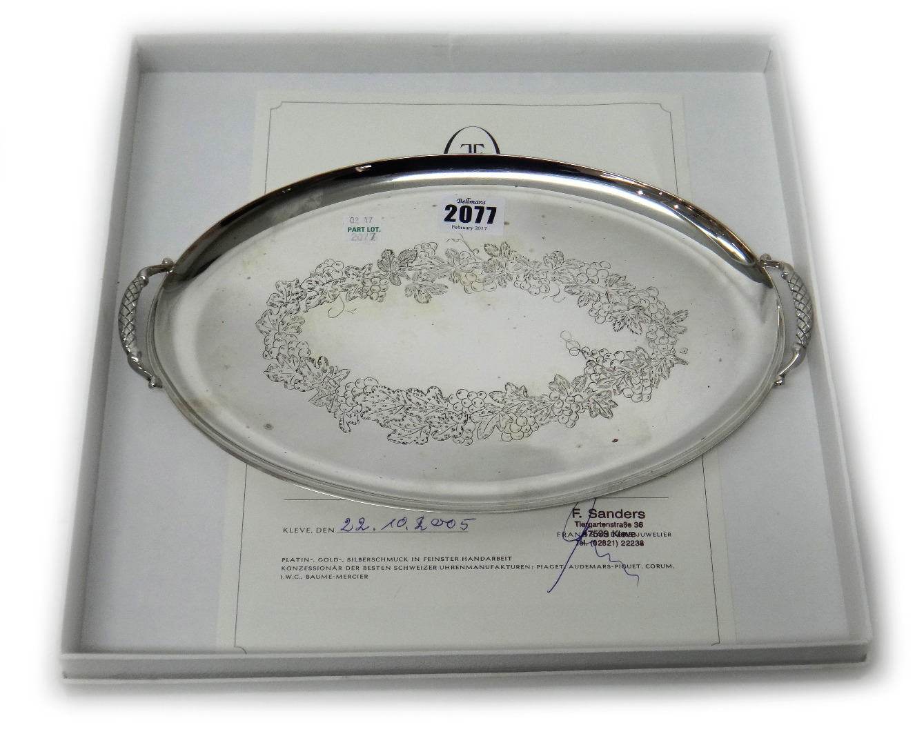 A European twin handled small oval tray decorated with a