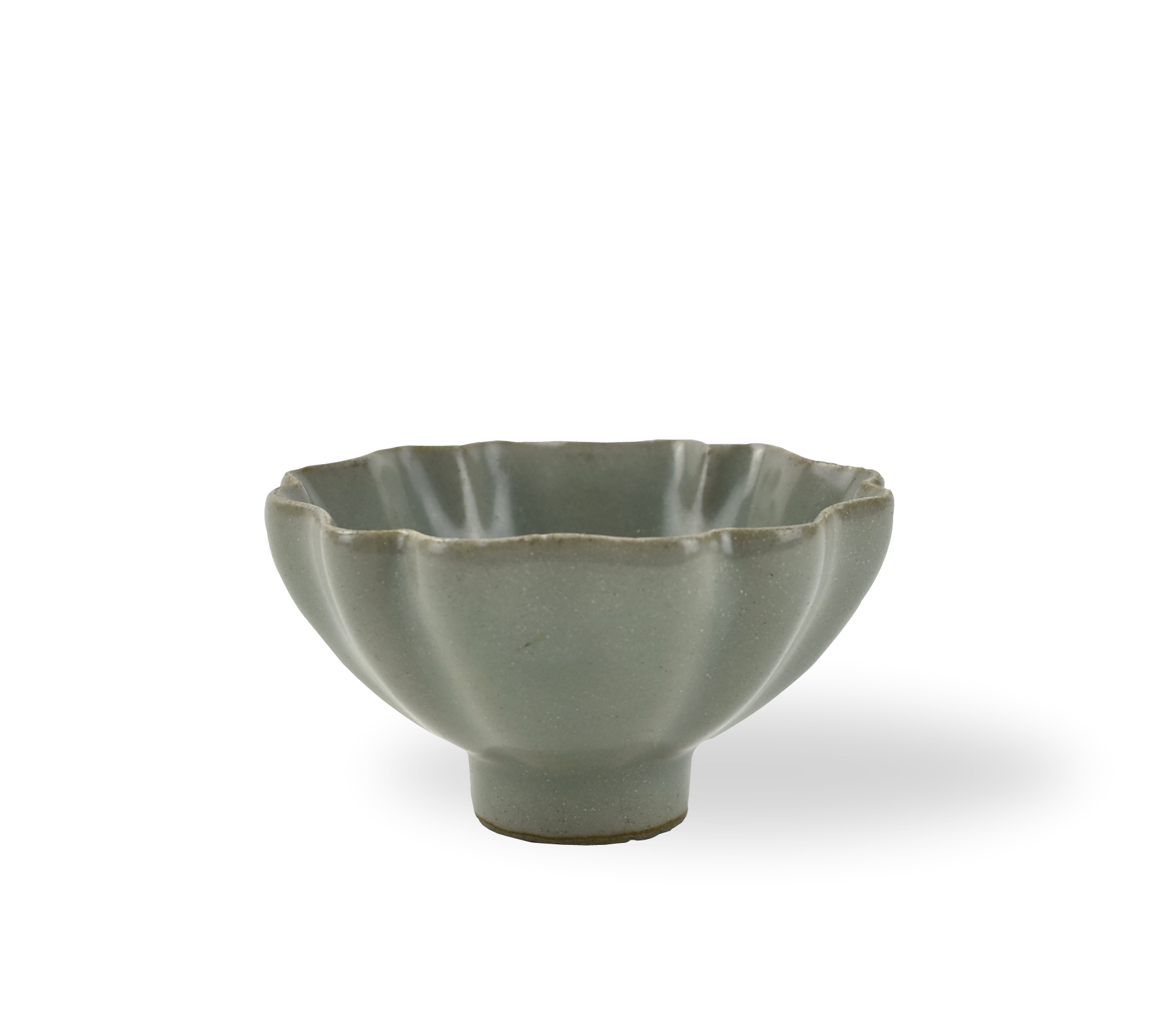 the rounded fluted sides rising from a short straight foot