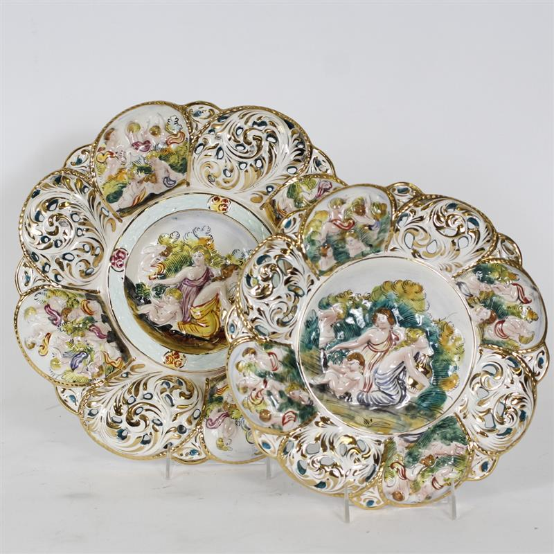 Pair of porcelain Italian Capodimonte wall hangings with classical women