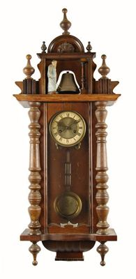 A beech Vienna regulator automaton wall clock with a twin