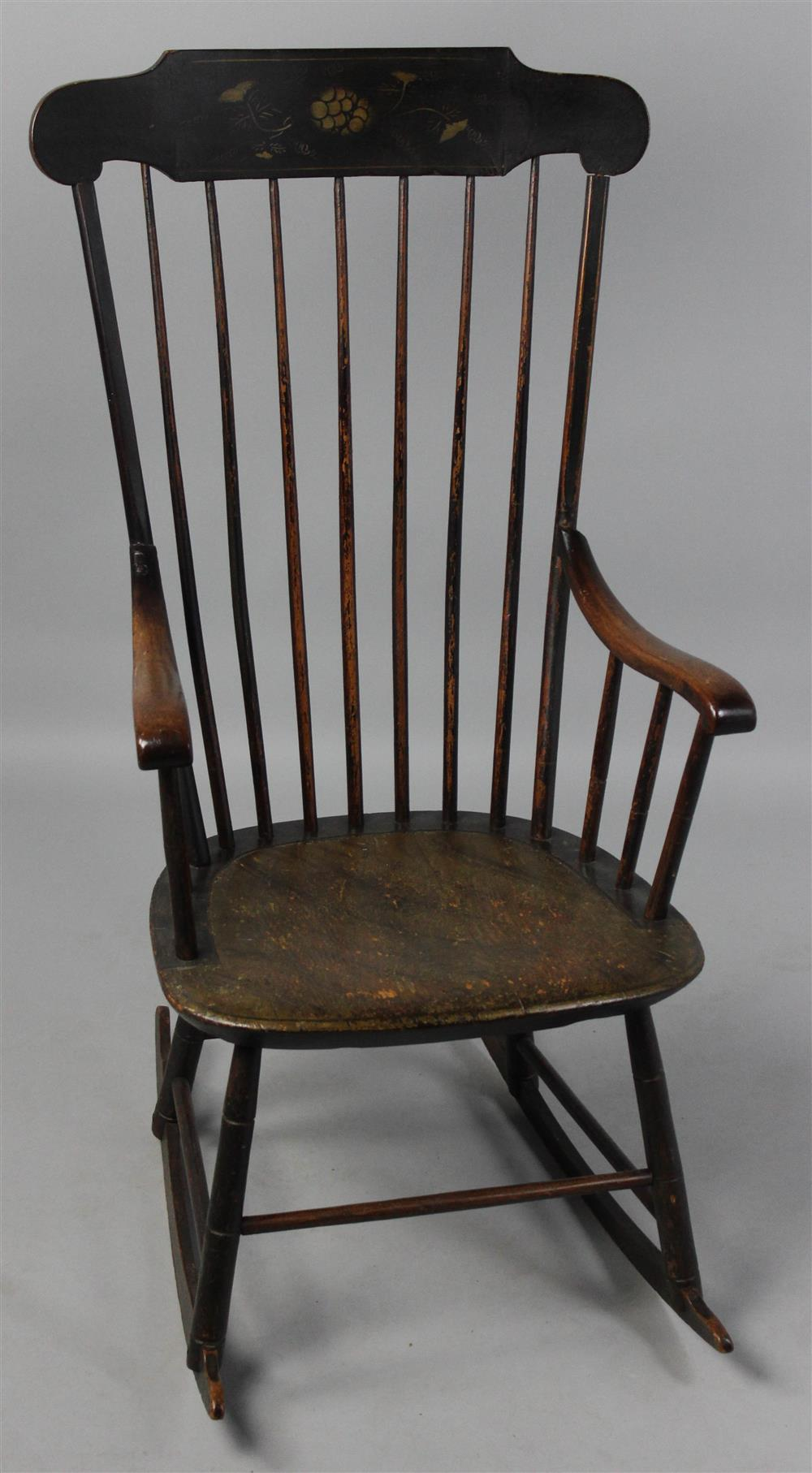FANCY PAINTED AND PARCEL GILT COMB BACK WINDSOR ROCKING CHAIR