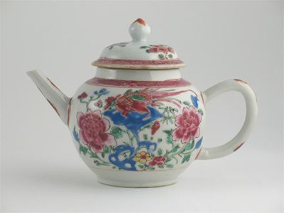 A Chinese famille rose teapot and cover painted with birds