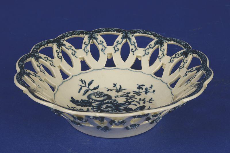 A FIRST PERIOD WORCESTER BLUE AND WHITE PIERCED BASKET circa