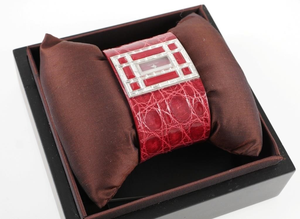 Womens Valentino Swiss made watch with genuine ruby or burgundy