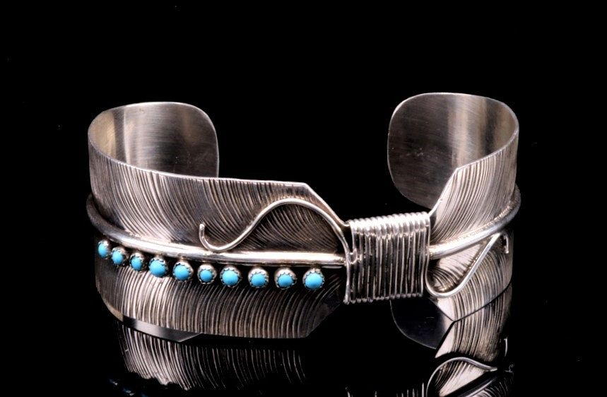 Navajo Sterling Silver Feather Turquoise Bracelet Featured in this lot
