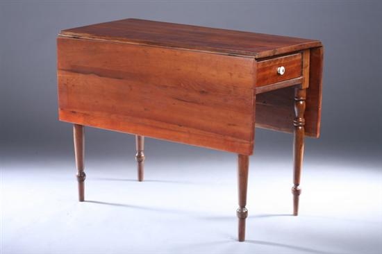 AMERICAN CHERRYWOOD DROP LEAF DINING TABLE Early 19th century Frieze