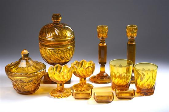 21 PIECES AMBER GLASS Including six cocktail glasses four dessert