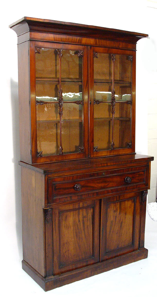 Early Victorian mahogany bookcase the moulded cornice above a pair