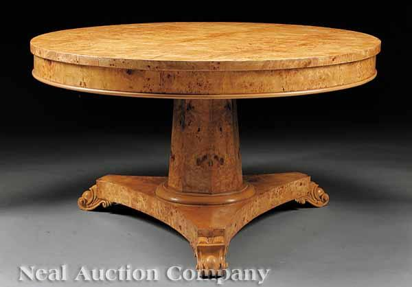 A Figured Burlwood Center Table in the Style of the