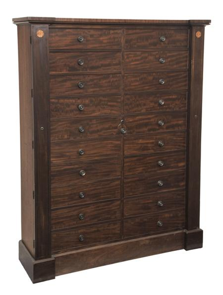 A Regency mahogany double Wellington chest the eared moulded cornice