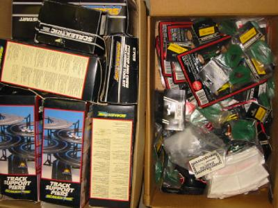Ten Scalextric accessories packs boxed and a carton of bubble
