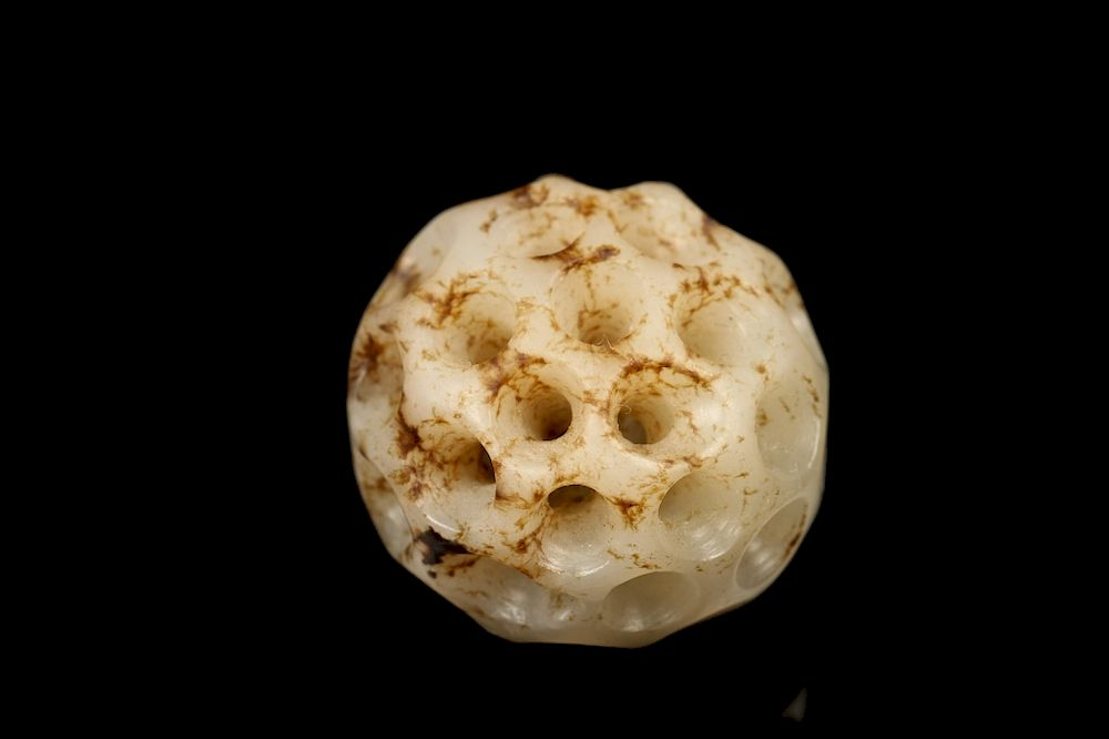 LARGE JADE BEAD PENDANT Of a sphere carving with numerous