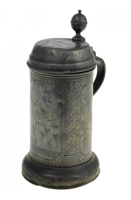 A GERMAN PEWTER TANKARD cylindrical on domed foot engraved with