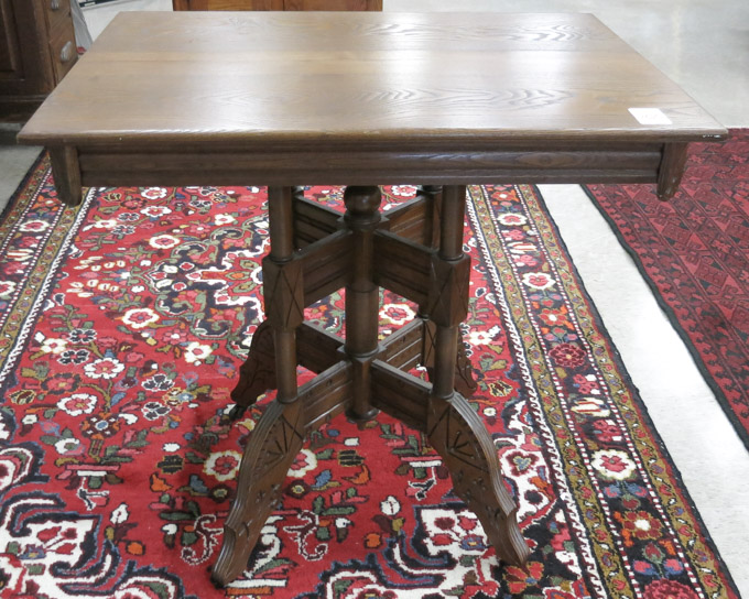 A VICTORIAN ASH WOOD LAMP TABLE Eastlake design American late