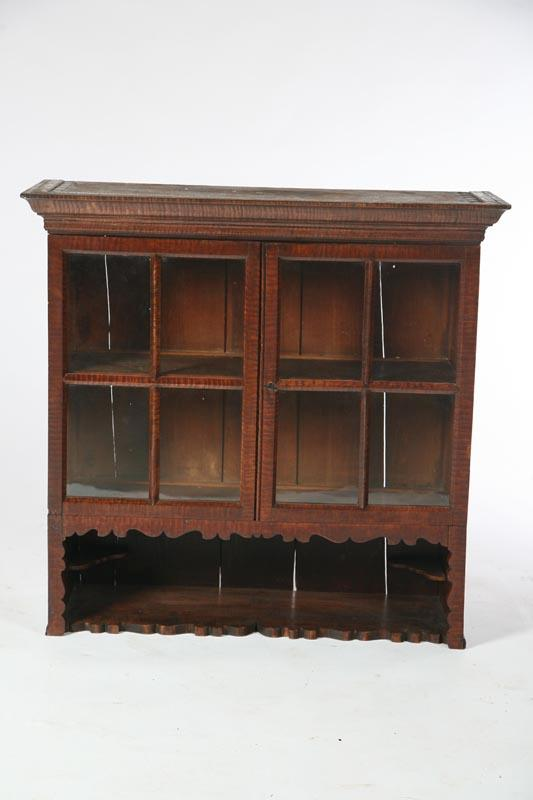 HANGING CUPBOARD American mid 19th century curly maple with pine
