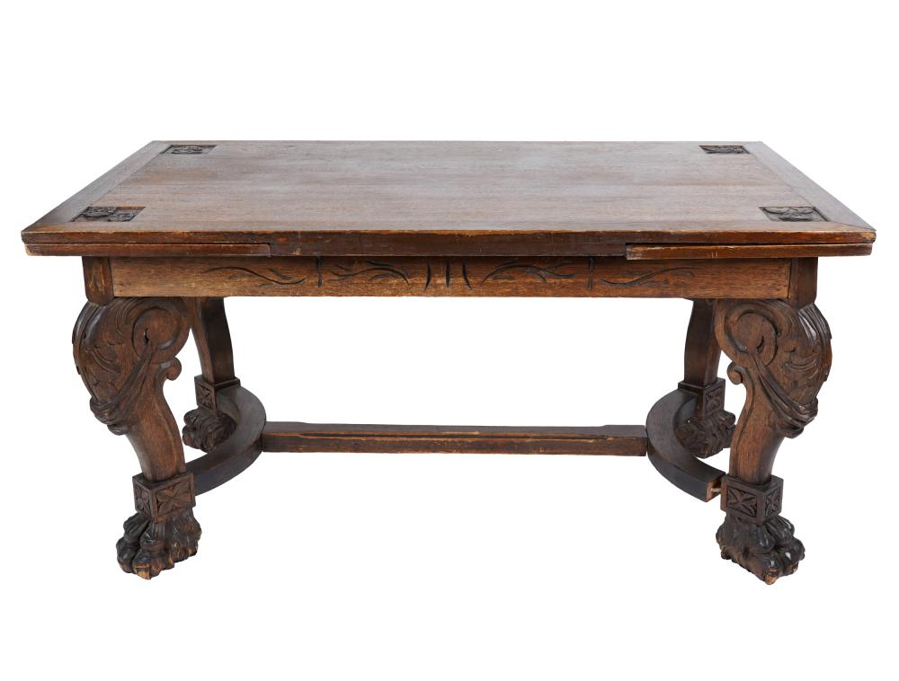 BAROQUE STYLE CARVED OAK EXTENDING TABLEthe rectangular top relief carved