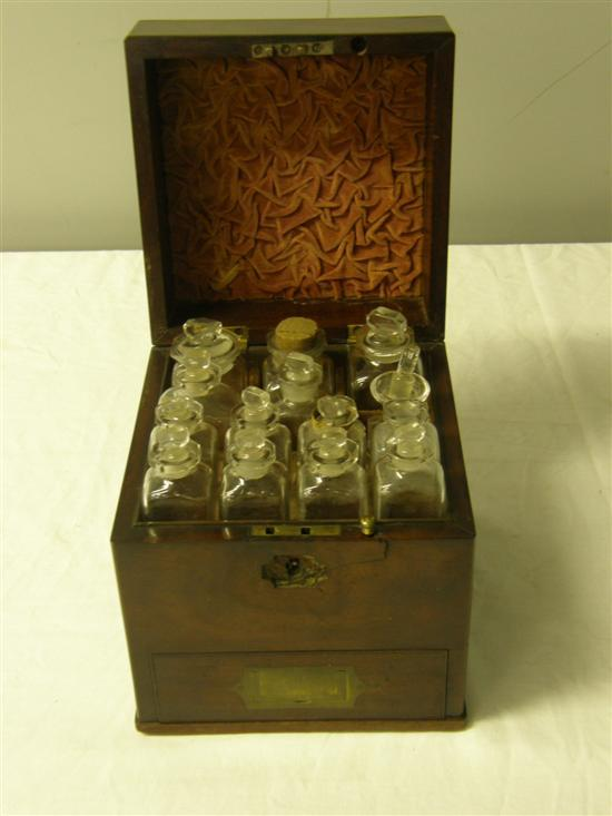 19th Century apothecary s mahogany box hinged cover revealing fourteen