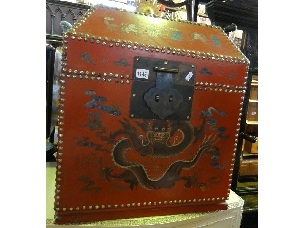 A Chinese red lacquered casket of square cut form with