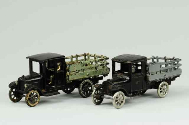 LOT OF TWO ARCADE CHEVY STAKE TRUCKS Arcade cast iron