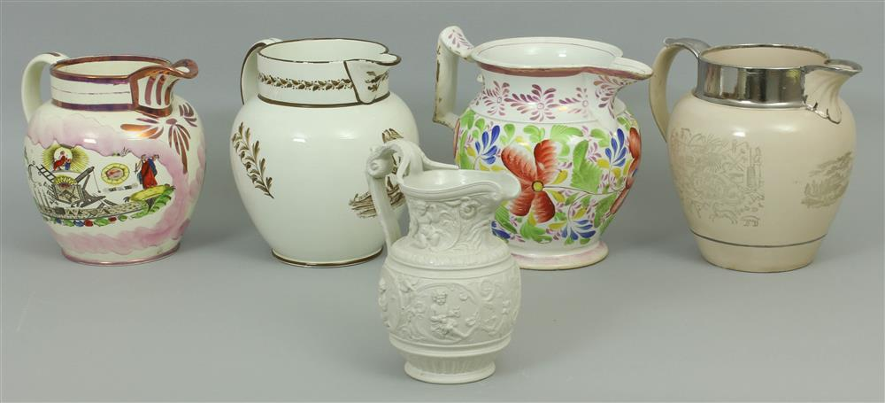 FOUR ENGLISH LUSTRE AND CREAMWARE PITCHERS AND A SALT GLAZED