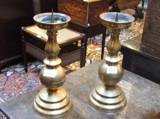 A PAIR OF OLD BRASS PRICKET CANDLESTICKS with baluster turned