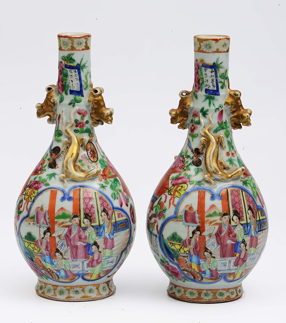 A pair of Chinese Canton bottle vaseslate 19th Century each