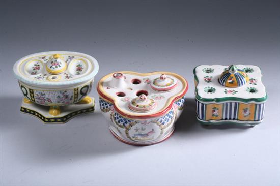 THREE FRENCH FA ENCE INKWELLS One oval on paw feet