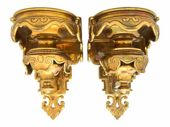 A Pair of Bronze Brackets each having a rectangular platform