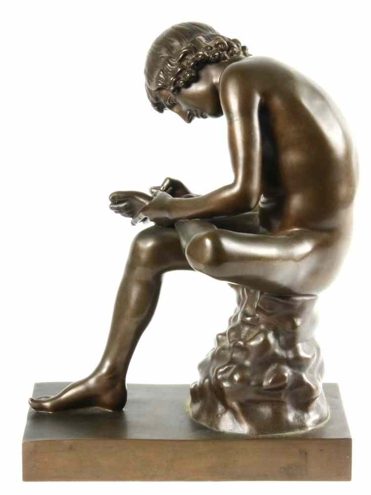 SCULPTURE French bronze of young lad removing thorn from his