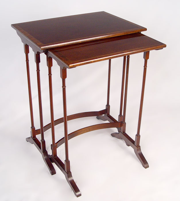 NEST OF TWO BANDED MAHOGANY SIDE TABLES BY BAKER Metal