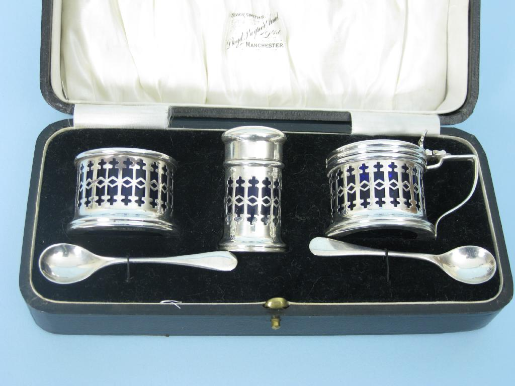 A George V three piece pierced circular Condiment Set with