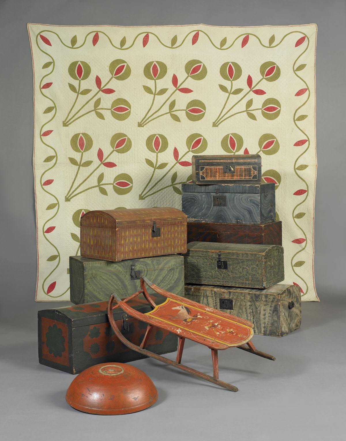 GREEN PAINTED AND DECORATED BOX OF DOVETAILED CONSTRUCTION WITH EXUBERANT
