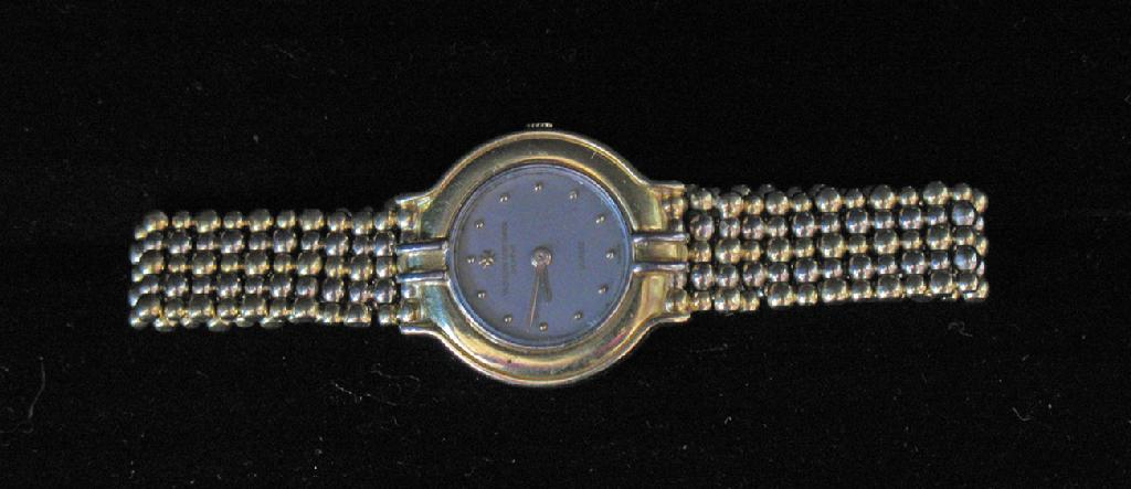 A LADIES VACHERIN AND CONSTANTIN GOLD WRISTWATCH stamped 750 the