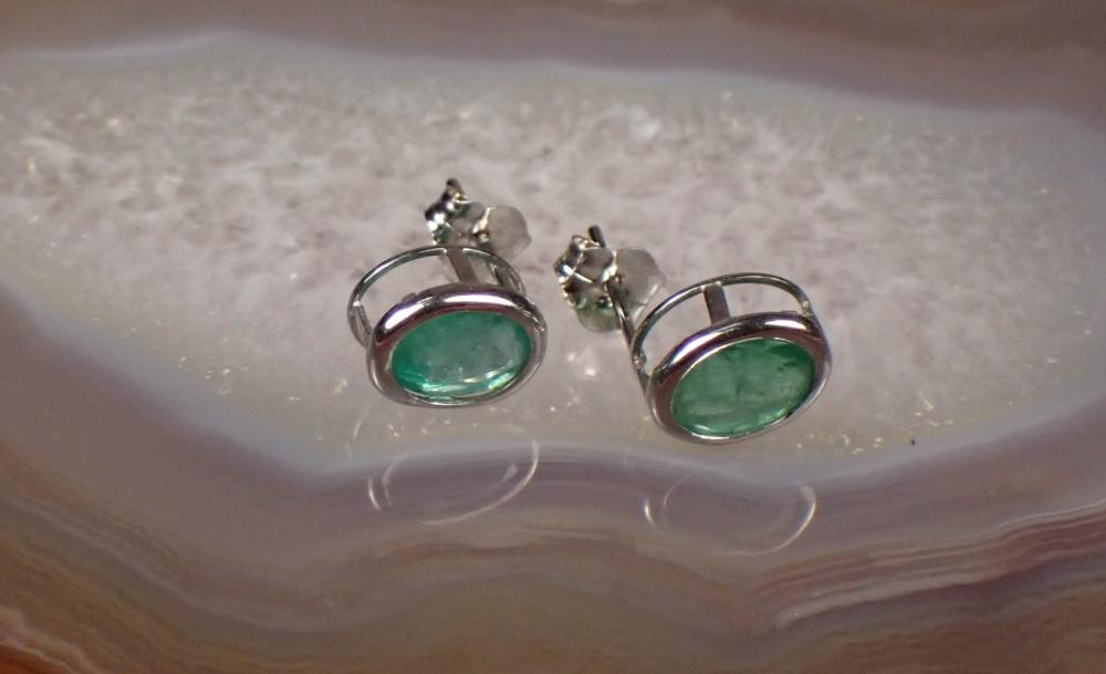 PAIR OF EMERALD AND FOURTEEN KARAT GOLD EAR STUDS each
