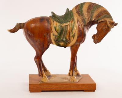 A Chinese sancai glazed horse on plinth 20th Century the