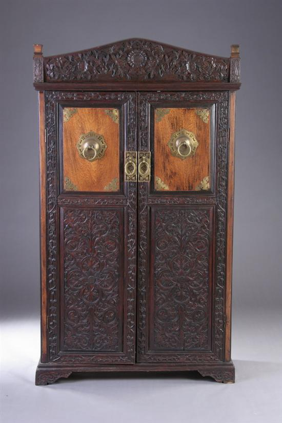 ANGLO INDIAN TWO DOOR CABINET 20th century Well carved pediment