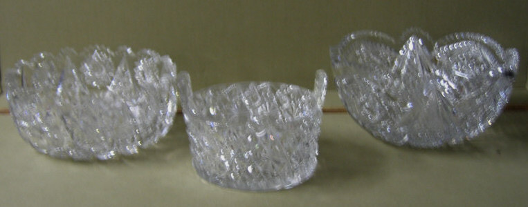 THREE BRILLIANT CUT GALL BOWLS Various star motifs one pail