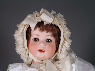21 HEUBACH KOPPELSDORF BABY Adorable Heubach Koppelsdorf baby with brown