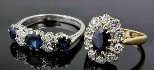 A modern 18ct white gold mounted sapphire and diamond seven