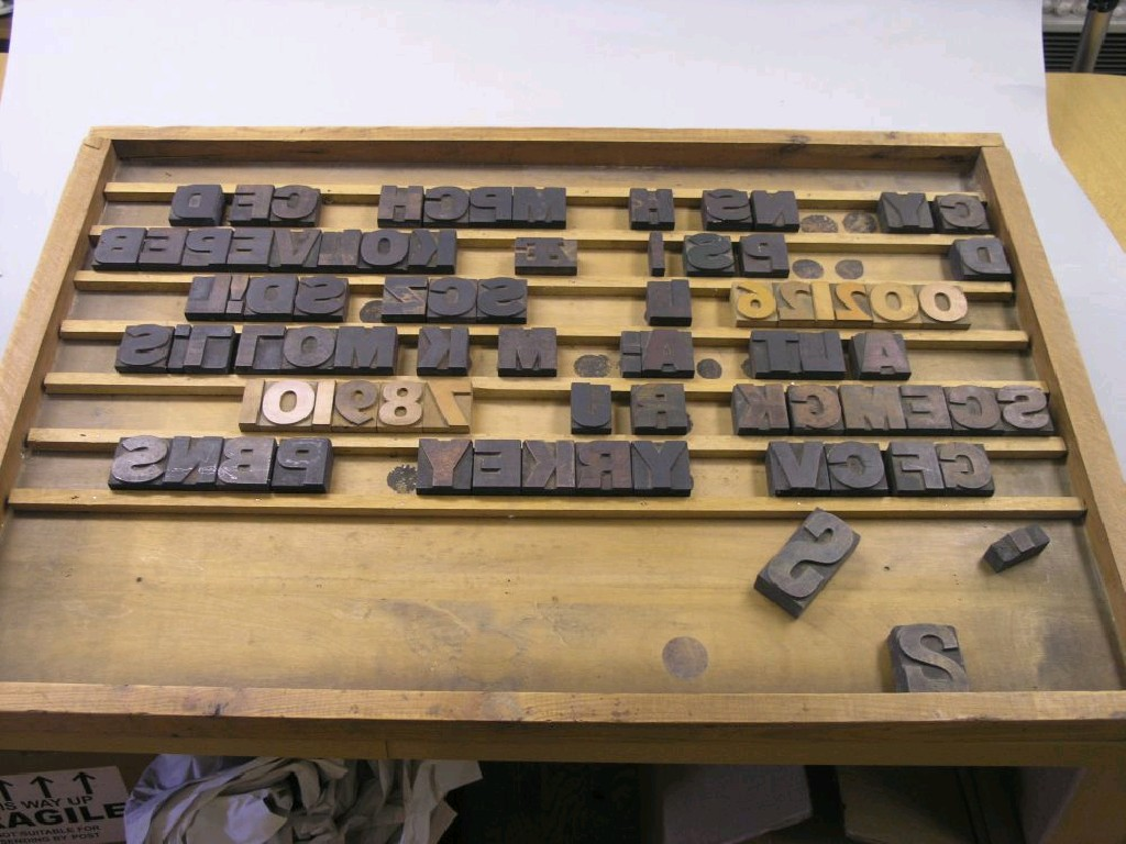 A quantity of wood printing blocks alphabetical and numeric