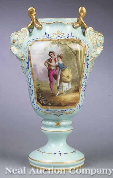 A French Polychromed and Gilt Porcelain Urn late 19th c