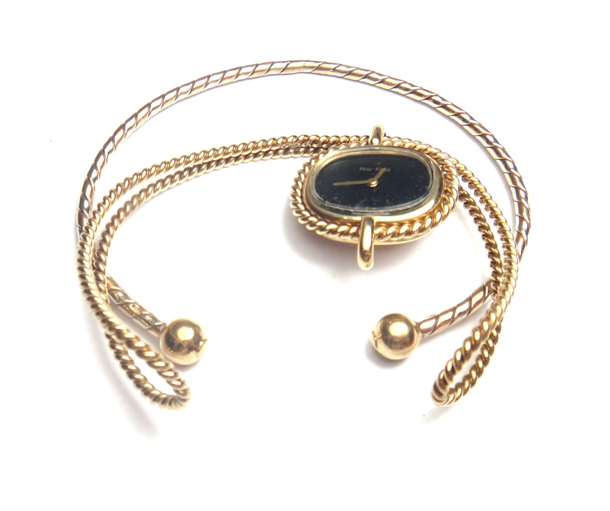 A ladies 9ct gold cased Roy King bangle wristwatch with