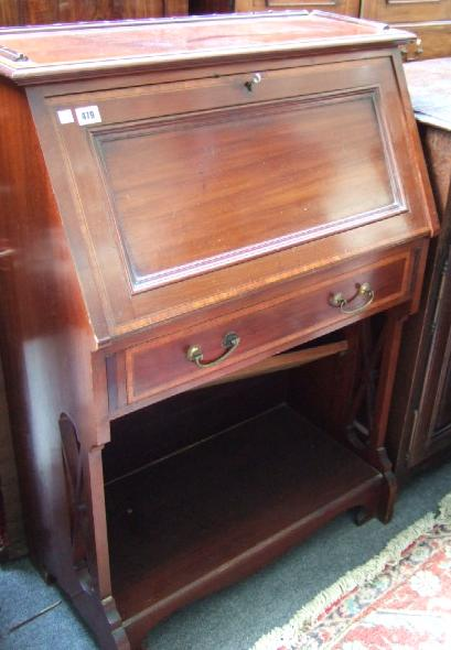 An Edwardian mahogany and inlaid student s bureau the fall
